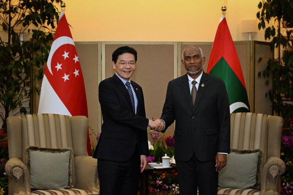 PM Lawrence Wong shaking hands with Maldives President Mohamed Muizzu at the Ministry of Foreign Affairs on June 30.  ST PHOTO: CHONG JUN LIANG