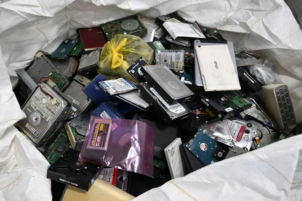 Close to 10,000 tonnes of e-waste have been collected already in 2025, a 60 per cent increase from the same period the previous year.  ST PHOTO: NG SOR LUAN