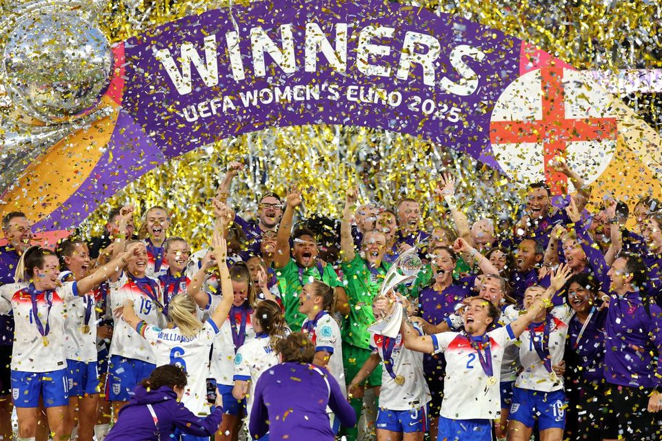 Soccer Football - UEFA Women's Euro 2025 - Final - England v Spain - St. Jakob-Park, Basel, Switzerland - July 27, 2025 England players celebrate with the trophy after winning the UEFA Women's Euro 2025 REUTERS/Denis Balibouse