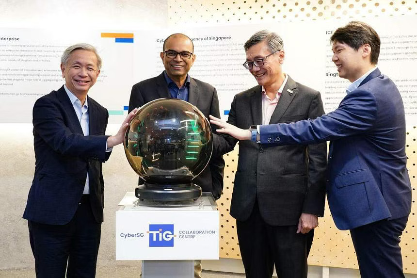 (From left) Chief executive of CSA David Koh, Senior Minister of State for Digital Development and Information Janil Puthucheary, NUS president Tan Eng Chye, and NUS Associate Professor Benjamin Tee at the official opening of CyberSG TIG Collaboration Centre.