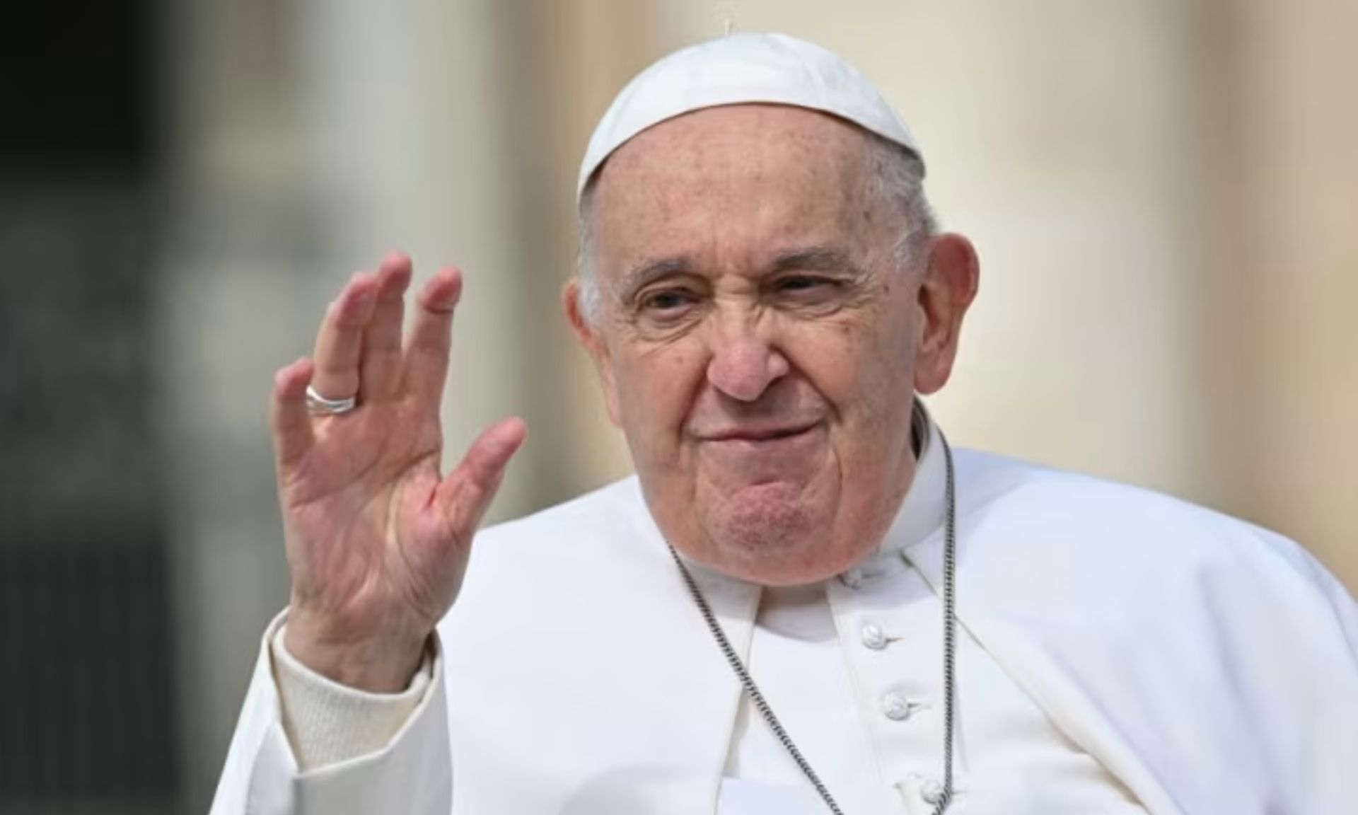 Pope Francis waves to the crowd