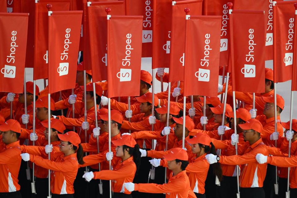 E-commerce platform Shopee made its maiden NDP appearance alongside 17 other contingents from social and economic groups.  ST PHOTO: AZMI ATHNI