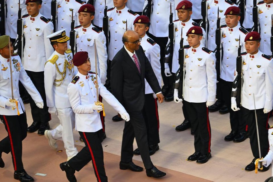 President Tharman Shanmugaratnam inspecting the parade.  ST PHOTO: GIN TAY