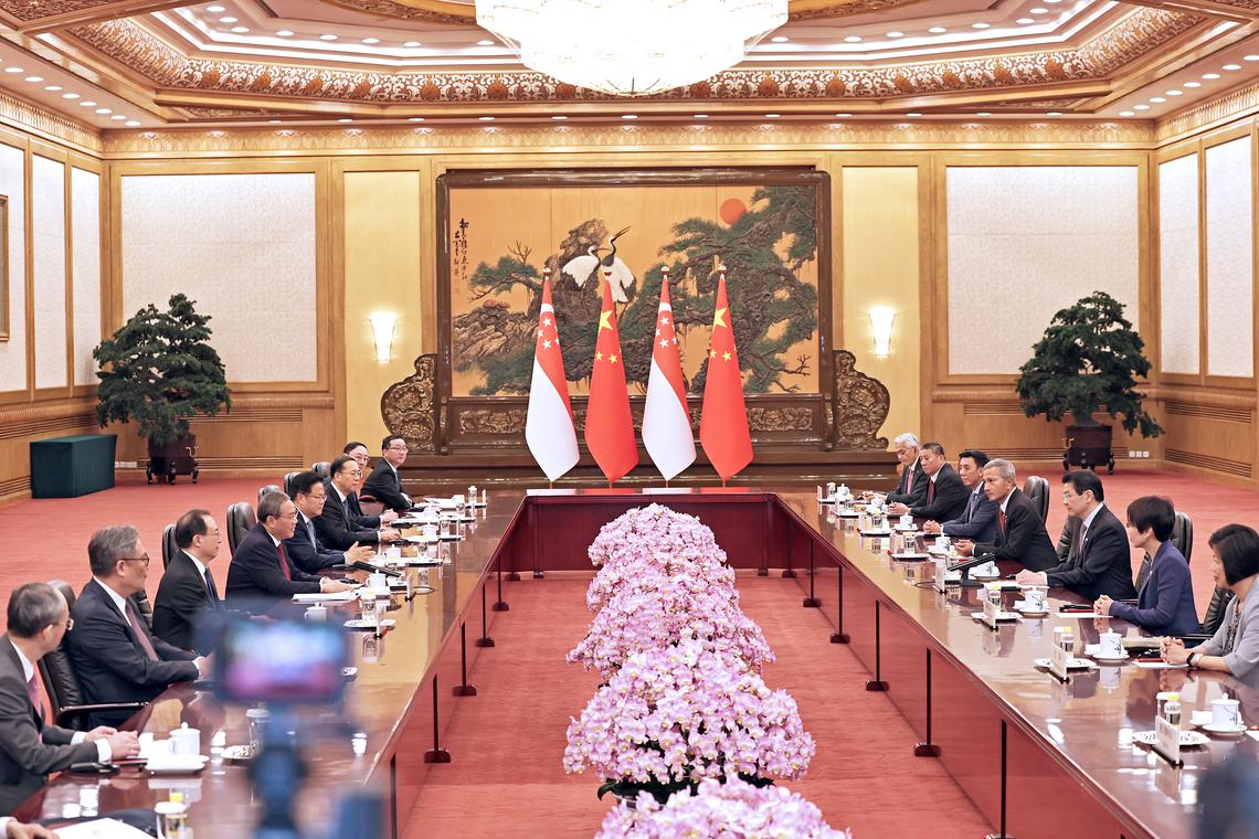 Singapore Prime Minister Lawrence Wong and China’s Premier Li Qiang attended a delegation meeting at the East Hall of Great Hall of the People in Beijing, on June 23.ST PHOTO: KELVIN CHNG
